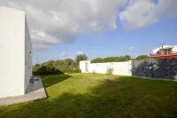 Villa in Los Caños de Meca of 1000m2 plot next to the field and the beach.