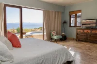 Large Luxury Beachfront Villa with Pool, Paddleboards, Golf Carts- Family Ready!