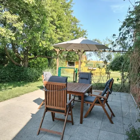 Beautiful vacation apartment with large outdoor terrace near the dike Отели в г. Зимонсберг