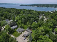“Pet-Friendly Geneva Lake Cabins – Fire Pit, Private Units, Walk to Lakefront”