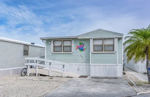 Waterfront home with numerous amenities on popular Cudjoe Key!