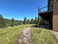 Casa del Sol is a private oasis surrounded by trees near Pactola Lake.