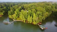 Experience Kentucky Lake out the back door! Spacious 4-bedroom retreat awaits.