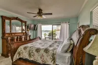 Watch dolphins play in Shelter Cove while swimming in our oversized  pool - Wifi