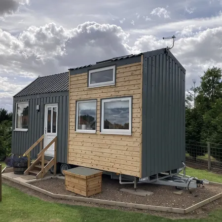 The Cedar Tiny House Отели в г. Аймут