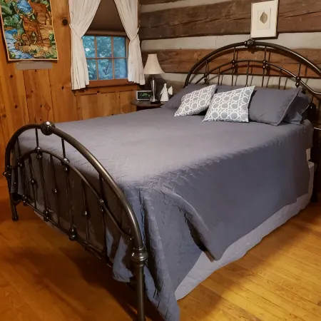 Come to the mountains to a rustic cabin by a creek.