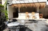 Palm Garden Kuta Отели рядом с достопримечательностью «Кута- Бич»
