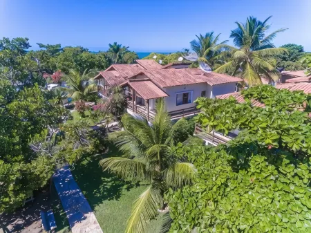 Village Muta Отели рядом с достопримечательностью «Coroa Vermelha Beach»