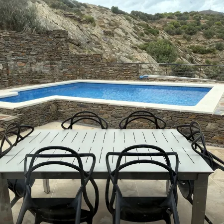 A charming family home with private pool in Cadaques with sea views.
