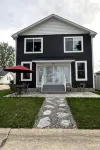 Lakefront home. Beach & park access. 8 miles to Cedar Point. 4 bedrooms 3 baths.