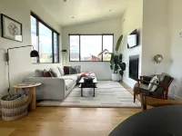 Sunlit loft with fireplace and king bed