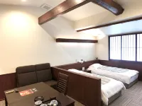 Sennennoyu Koman Hotels near Genbudo Park