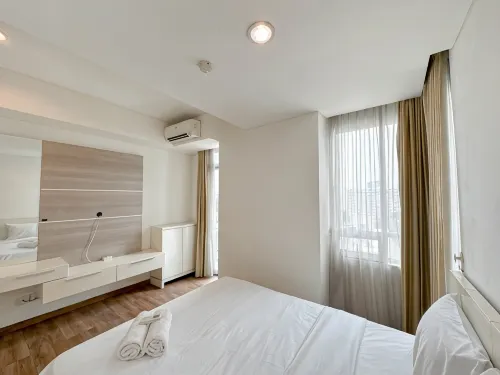 Restful and Good Location 1BR Apartment at Trillium Residence By Travelio - Condos