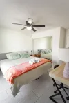 Steps to Beach & Shops - King Suite - Private Patio & Grill + Parking