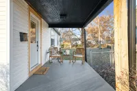 Urban Oasis: A Charming Downtown Retreat with Game Room, Firepit and Yard Games