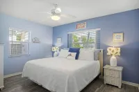 4-Bed Coastal Retreat: Heated Pool, 200 Steps to Beach, Walk to Fun!