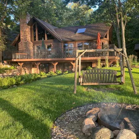 Whitefish Chain Lake Home with Beach + Sauna + King Beds + Kayaks +Paddle Boards