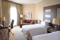 Al Corniche Hotels near Al-Khaskiah Shopping Centre