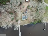 Private Riverfront Home with dock Hotels in Cople