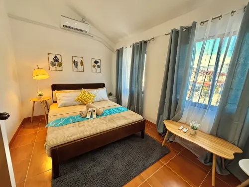 Cozy 2-Bedroom House Rental in Sibulan, Philippines - Wifi