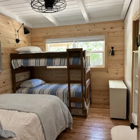 Secluded waterfront fishing cabin, boat dock, pier, sunsets, boat to beach
