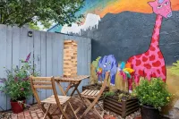 The Arusha House Capitol: Hill : Garage : Yard - Bungalows