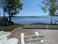 NEW! Renovated lakeside cottage with a private sandy beach. Great Location!