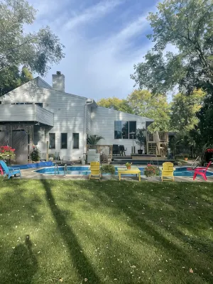 Contemporary home in quiet neighborhood with pool & great back yard close to all