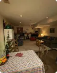 Charming 2-bedroom apartment with outdoor hot tub in rural area, private yard.