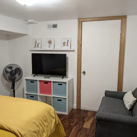 Lovely basement apartment with covered outdoor patio.