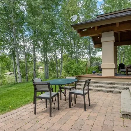 Ski bus stops at front door, court sports and indoor game room, bike path
