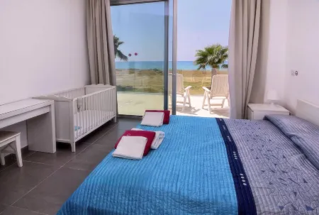 Blue - Beach Front Spectacular Villa Sleeps 10