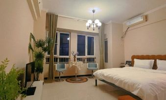 Yuerong Bay 24-Hour Serviced Apartment (Central Academy Mingrun Plaza Zuodi Road)