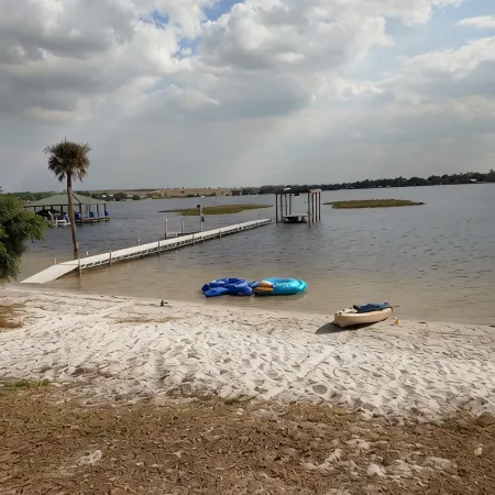 Beautiful home with white sand beach on stunning Crooked Lake