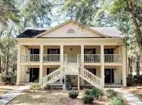 Spacious condo on Jack Nicklaus Signature Golf Course overlooking 10th Tee Box.