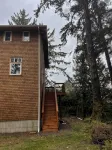private hot tub, fun game room, cozy beach house