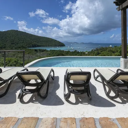 Walk to world famous Maho Bay! Privacy, views, pool, 4 equal king size bedrooms.