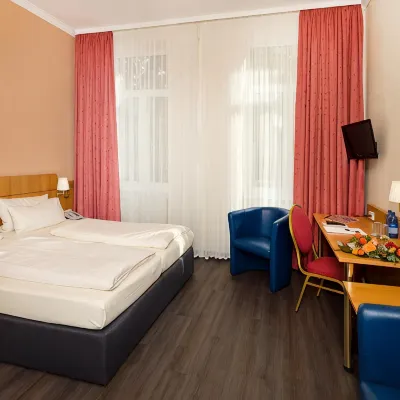Hotel Königshof Отели рядом с достопримечательностью «Таберна Археологика»
