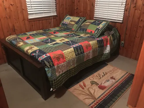 Indian Lakes Cabin with private beach and dock lake side