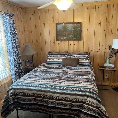 Ben Ranch Cabin # 2 located in a century old Pecan Orchard. 2 Bedroom plus couch