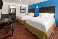 Travelodge by Wyndham Manhasset Hotels near Tina Demel Inc