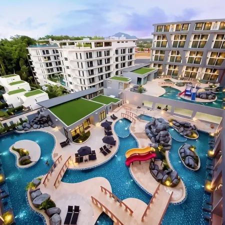 Utopia Loft Aparthotel by Sabai Sands Отели рядом с достопримечательностью «Пляж Най-Харн»