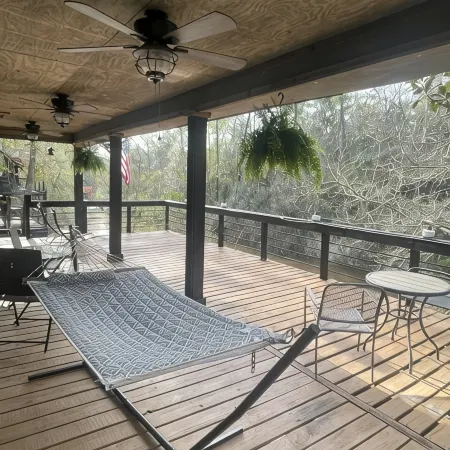 Creek-side getaway, big deck, easy access to the city while being off the grid!