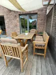 Modern holiday apartment with a large terrace and garden near Hamburg