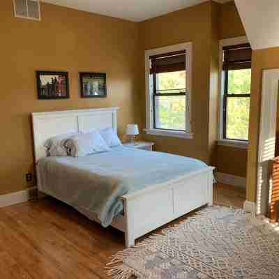 Beautiful 3-bedroom condo just steps from the track and downtown! Rooms