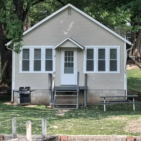 Newland's Resort: Cozy Channel Front Cottage #2 on Indian Lake with a Boat Dock