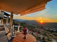 Stone Maisonettes Hotels in Longos
