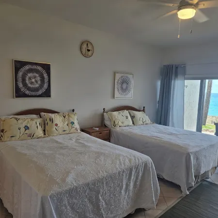 Beachfront condo at beautiful Cupecoy Beach Club.  2 bedroom, 3 bath, amenities!