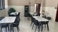 Muli Xinsheng Business Hotel - Bữa sáng