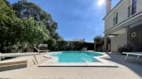 Dream vacation apartment with large heated pool and beautiful garden